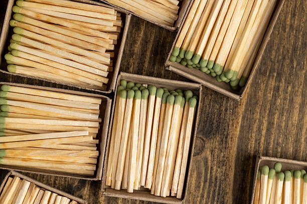 istock filling wooden matchboxes with matches with sulfur for ignition, open matchboxes with new matches made of natural wood, closeup 2250678950