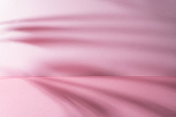 istock Soft gradient pink background with gentle shadows, creating a serene atmosphere 2250678980