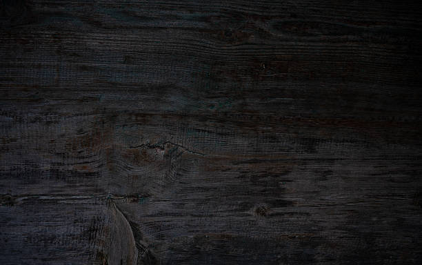 istock Dark rustic wooden background with scratches, grain and subtle texture — suitable as moody backdrop. 2250679656