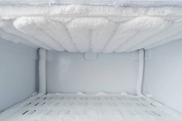 istock Interior of freezer compartment covered with uniform frost on evaporator ribs, clear example of excessive ice buildup before defrost 2250680235