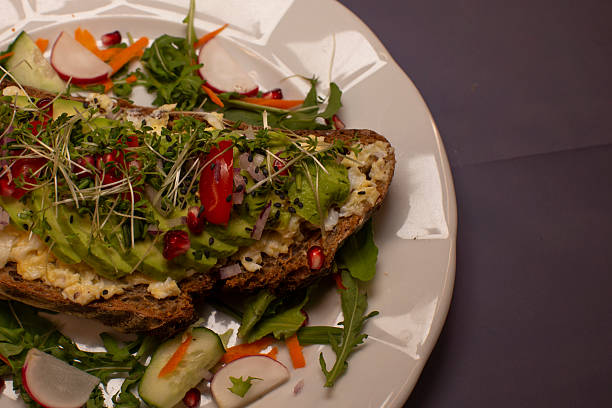 istock Vibrant sandwich filled with fresh greens and crunchy vegetables 2250681065
