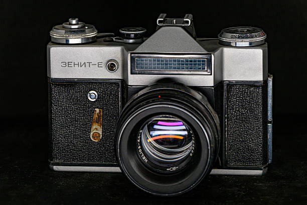 Novi Sad, Serbia - December 03, 2025: Zenit-E 35mm SLR camera with a Helios 44-2 58mm f/2 lens.