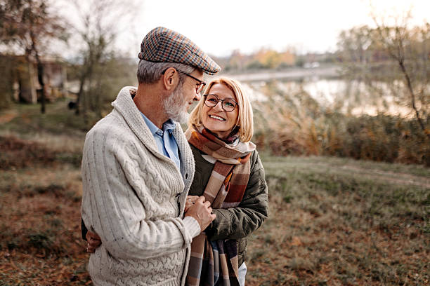 istock Mature couple bonding by the lake 2250682844