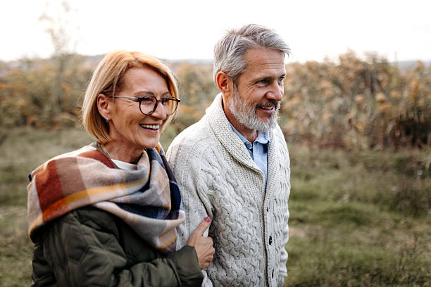 istock Mature couple walking together in nature 2250682993