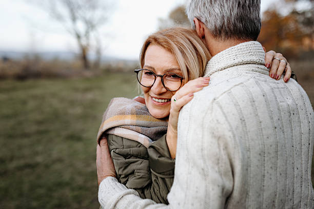 istock Mature couple hugging outdoors in nature 2250683027