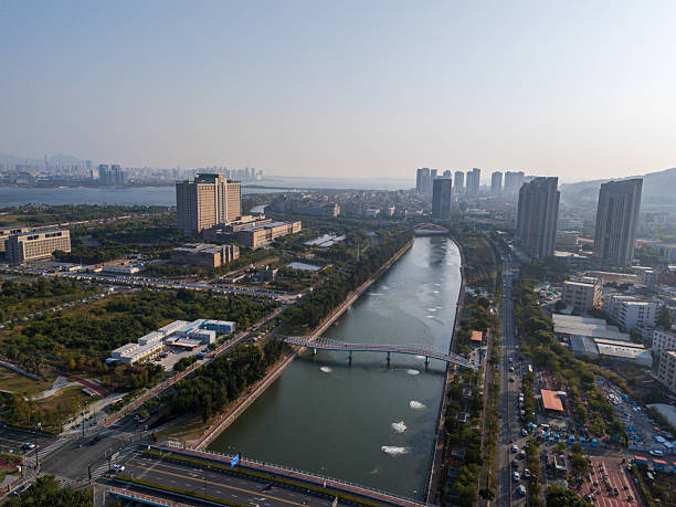 istock Aerial View of Urban River and Building Complex 2250683889