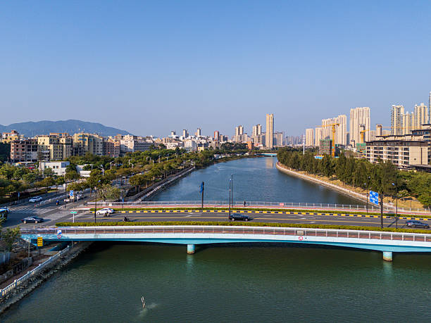 istock Urban River Bridge and Building Complex Landscape 2250684109