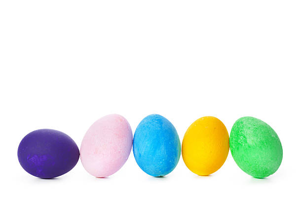 istock Colorful eggs lined up for spring celebration and holiday festivities 2250686424