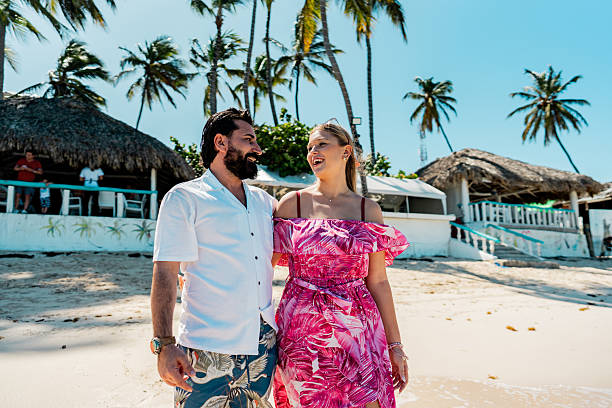 istock Couple talking on the beach 2250687744