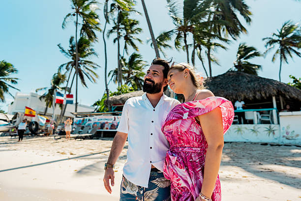 istock Couple looking at view on the beach 2250687755