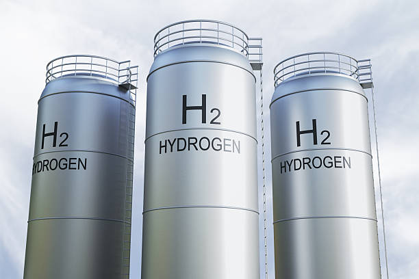 istock Hydrogen H2 storage tanks in modern industry facility with metallic surface under light sky background, nobody around, clean energy concept. 3D Rendering 2250688473
