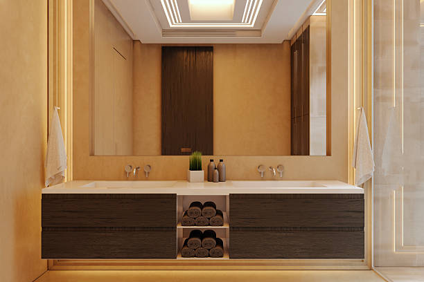 istock Modern luxury bathroom interior with wooden vanity, illuminated ceiling, and dual sinks in elegant empty room design with warm lighting. 3D Rendering 2250688864
