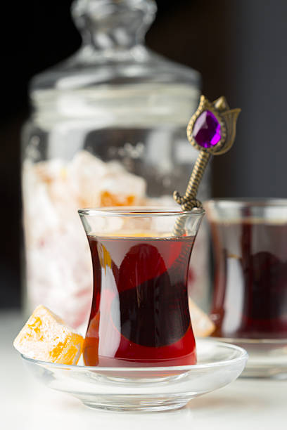 istock Warm red tea served with sweet treats in a cozy setting 2250693755