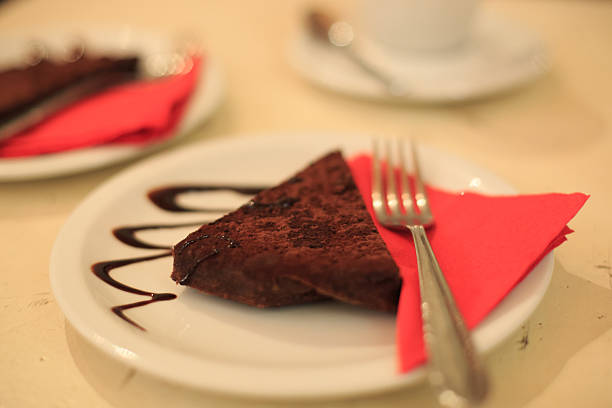 Enjoying Italian coffee culture - a slice of chocolate cake