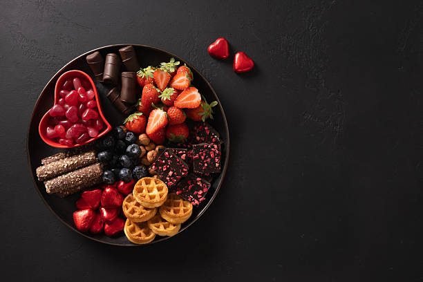 istock Charcuterie Valentines Day board with chocolate sweets. 2250696981