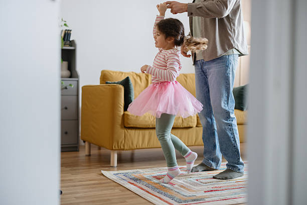 istock Little Girl Performing Ballet for Father 2250705364