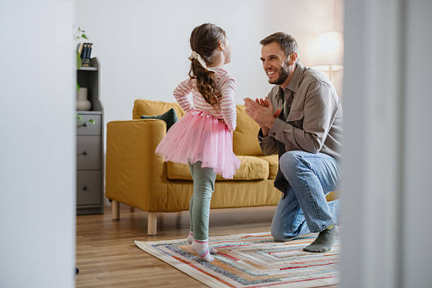 istock Little Girl Performing Ballet for Father 2250705403