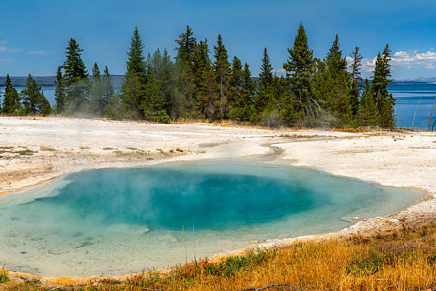 istock Surging Spring and Yellowstone Lake in West Thumb Geyser Basin 2250707282
