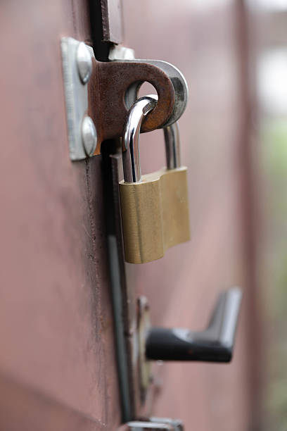 istock Padlock On Metal Door Representing Security And Protection 2250707939