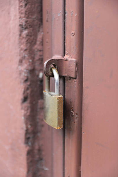 istock Metal Door Locked With Padlock For Safety Concept 2250707955