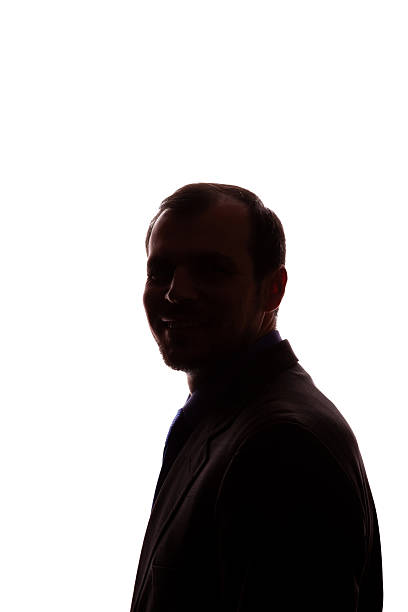 istock Smiling man young unshaven business clothes silhouette - white background isolate 2250707956