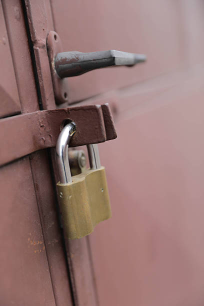 istock Padlock And Locking Mechanism On Urban Door 2250707976