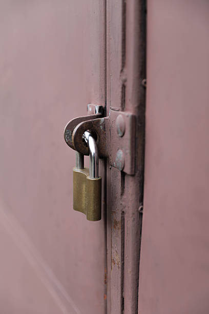 istock Locked Metal Door Representing Restriction And Control 2250708036