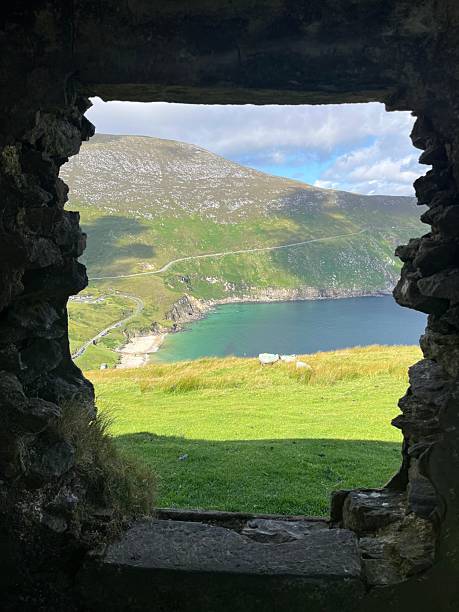 istock Scenic Coastal View Framed by Ancient Stone Window on a Sunny Day 2250709086