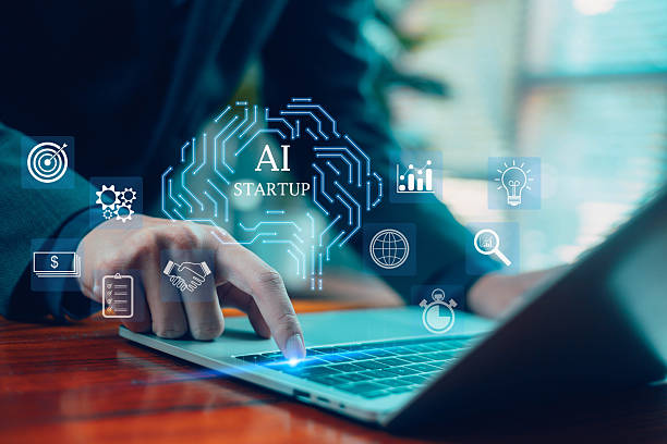 istock Futuristic AI startup concept featuring a glowing digital brain above a laptop as a businessman interacts with the device, surrounded by icons of analytics, global technology, and business strategy. 2250714542