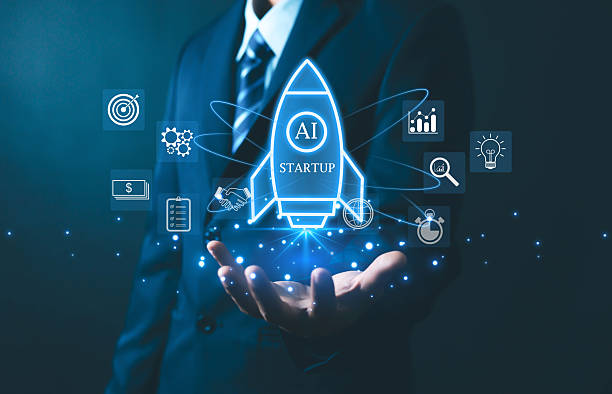 istock Futuristic AI startup concept showing a glowing rocket hovering above a businessman's hand surrounded by icons of innovation, analytics, finance, digital strategy in a modern technology environment. 2250716057