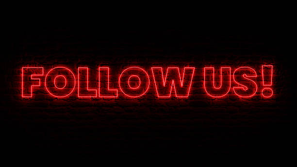 istock NEON Follow Us With Brick Background 2250718642