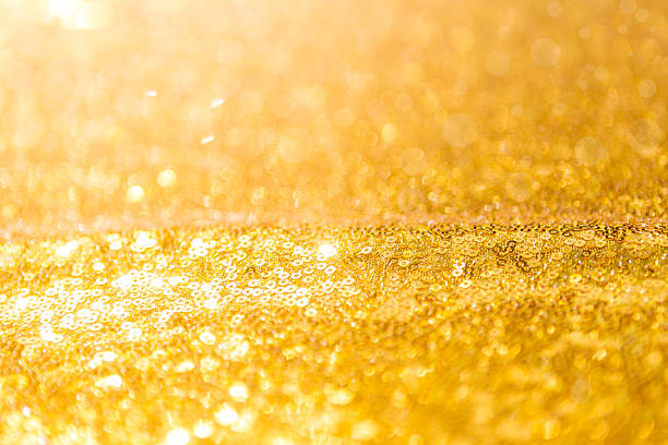 istock Close up blurred gold bokeh background 2250726773
