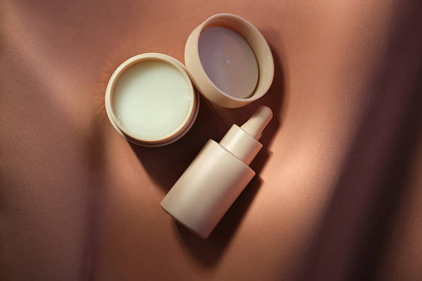 istock Face cream and serum on a soft beige background. 2250728649