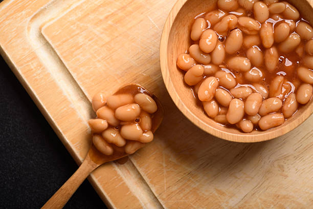 istock Baked beans from canned food on black background 2250729962