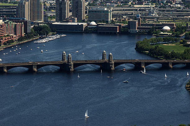 istock Sailboats Navigating Charles River Under Longfellow Bridge in Boston 2250736986