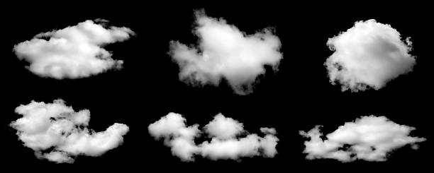istock Isolated fluffy cloud formations on a black background, ideal for sky overlays, weather graphics, digital composites, and design elements requiring realistic atmospheric cloud textures. 2250739961