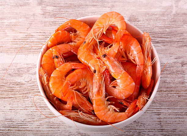 istock Cooked shrimps in white bowl 2250740735