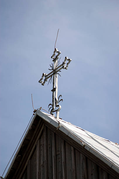 Wooden church. Architectural details. Probołowice, Poland. The wooden parish church of St. James the Apostle from 1759 and the wooden bell tower from the mid-19th century