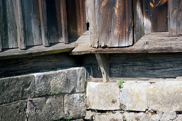 Wooden church. Architectural details. Probołowice, Poland. The wooden parish church of St. James the Apostle from 1759 and the wooden bell tower from the mid-19th century