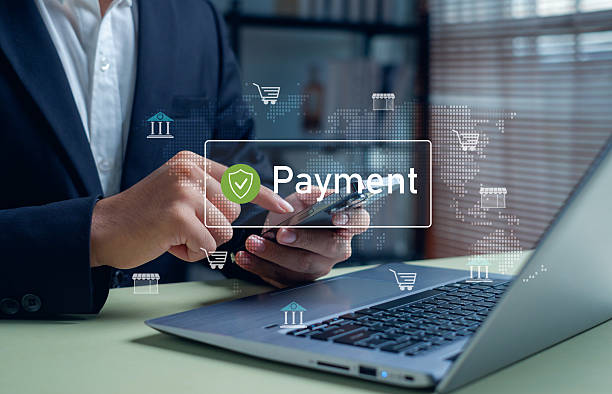istock business professional making a secure digital payment on a smartphone, representing online transactions, fintech solutions, mobile banking, global commerce, and modern financial technology. 2250741869