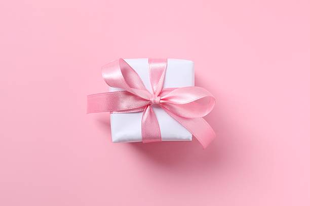 istock Beautiful gift box on pink background 2250742030