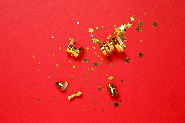 istock Golden confetti on color background, top view 2250743448