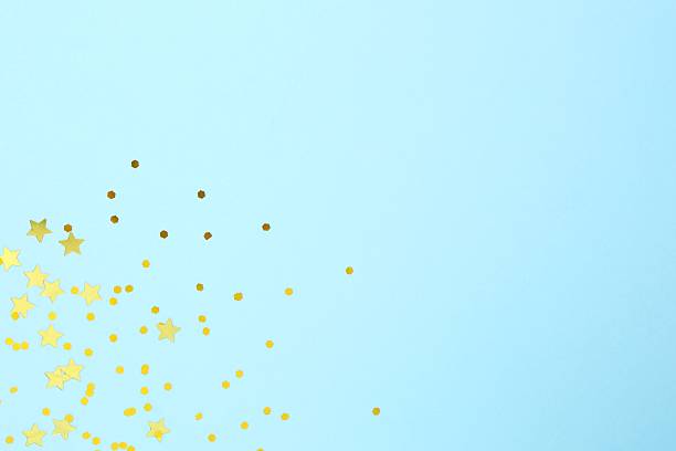 istock Golden confetti on color background, top view 2250744113