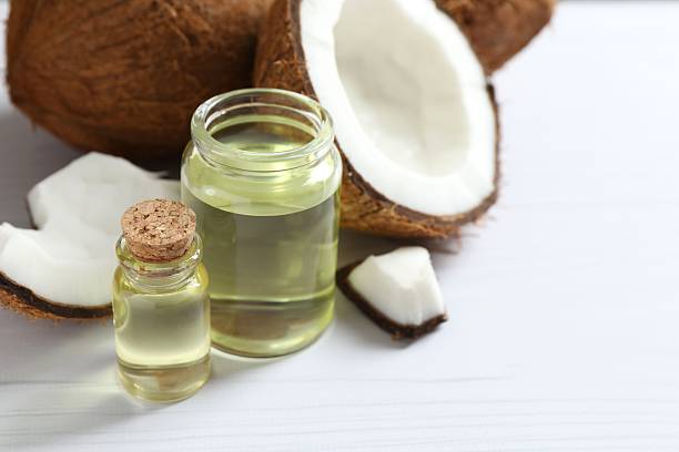 istock Bottle of coconut oil on the table 2250745605