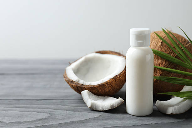 istock Bottle of coconut oil on the table 2250746092