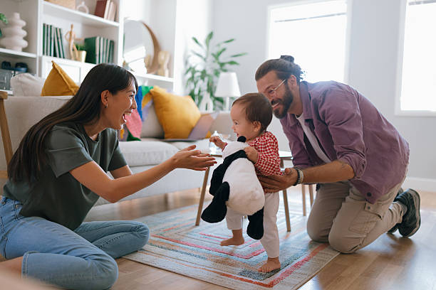 istock Toddler Taking First Steps Toward Mother 2250746512
