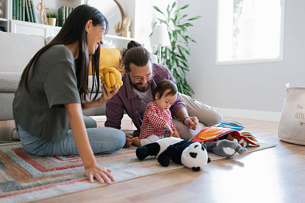 istock Parents Playing on the Floor With Their Toddler 2250746708