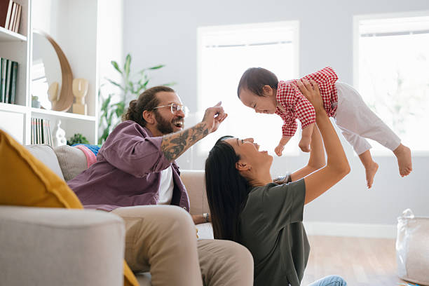 istock Parents Playing Together With Their Daughter 2250746790