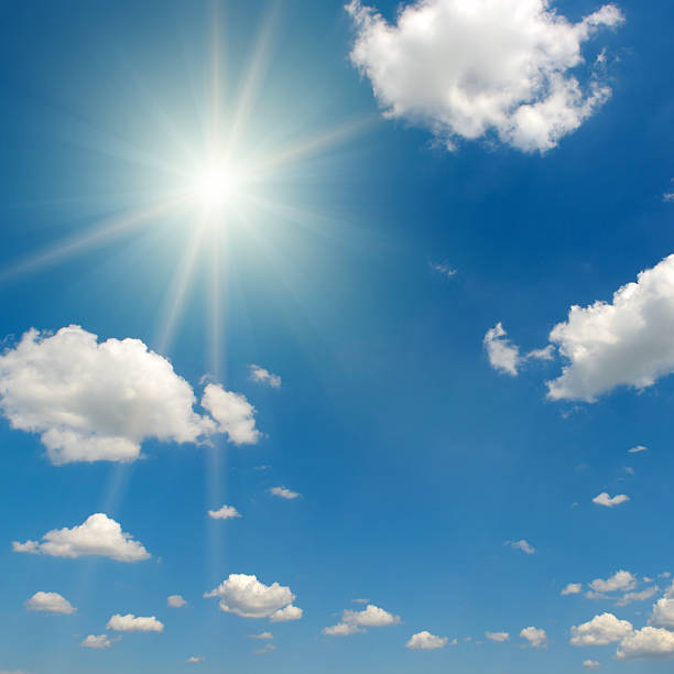 istock Bright midday sun and beautiful blue sky with clouds. 2250747179