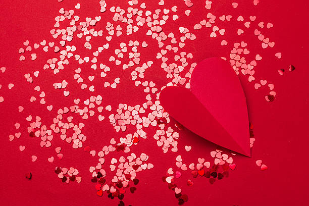 istock Red heart and confetti create a festive atmosphere for celebration or romantic occasion 2250749701